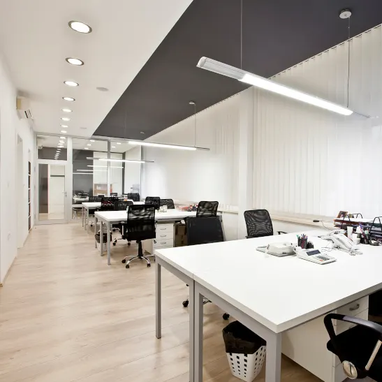 Commercial cleaning team at work in an office